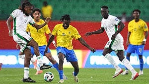 Nigeria advance after extra-time playoff win