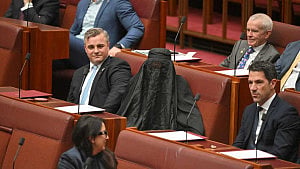 Australia’s far-right leader suspended over burqa stunt