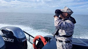 Malaysia hunts for 14 missing after migrant boat capsize