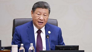 Xi pushes for global AI body at APEC
