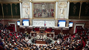French PM survives no-confidence votes after pension move
