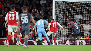 Arsenal battle past Olympiacos