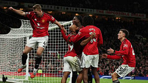 Man United edge through for third straight win