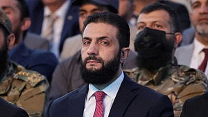 Syria's new ruler lays down law to loyalists
