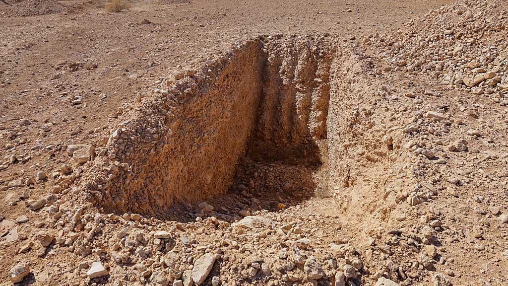 A detail of what one witness told Reuters was an incomplete trench dug to take bodies in this mass grave site in the desert near the eastern Syrian town of Dhumair, Feb 27, 2025. A Reuters investigation found that the Assad government secretly trucked thousands of bodies there from an exposed mass grave in the Damascus suburb of Qutayfah from 2019-2021. REUTERS