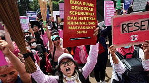 With brooms in hand, Indonesian women join Jakarta protests