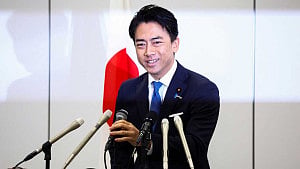 Japan PM contender Koizumi vows wage hikes