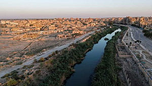Syria risks rupturing as armed camps face off across Euphrates