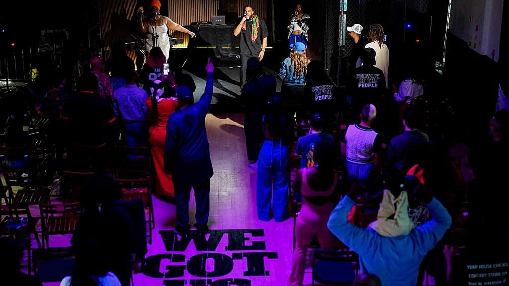 Community members listen to a Sunday service and performance by Recoechi, a Chicago-native rap artist, at Lincoln United Methodist Church in Chicago, Illinois, US August 31, 2025. REUTERS