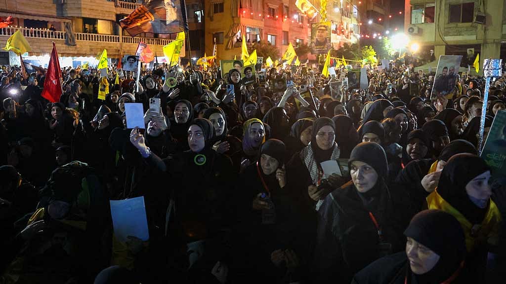 Hezbollah supporters gather at the site where the group's late leader Hassan Nasrallah was killed, before the first anniversary of his assassination in an airstrike, in Beirut's southern suburbs, Lebanon, Sept 26, 2025. REUTERS