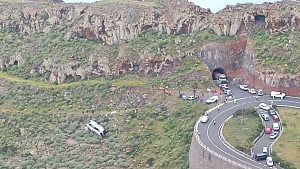 1 dead as UK tourist bus crashes in Spain