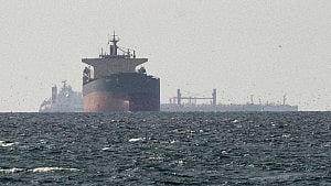 Iran says Hormuz shut, vessels report gunfire