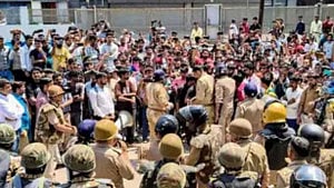 Police fire tear gas as Noida workers' protest turns violent