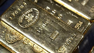 Gold gains over 1 percent on soft US data