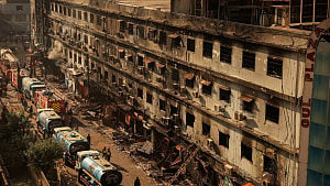 57 feared dead as rescue workers clear Karachi inferno ruins