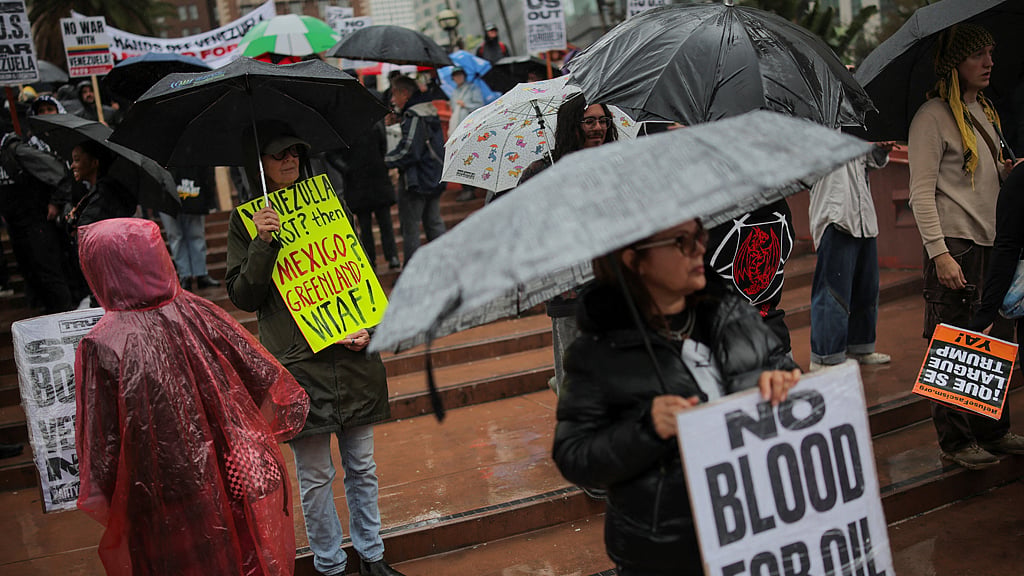 People protest against the US strikes on Venezuela and the capture of Venezuelan President Nicolas Maduro, during an anti-war rally in Los Angeles, California, US, Jan 3, 2026. REUTERS/Daniel Cole