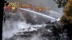 France, Spain race to curb wildfires