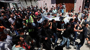 Gazans mourn aid worker killed by Israel