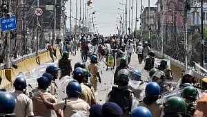 India suspends policeman for firing at student protesters