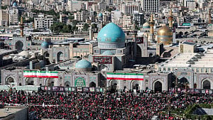 Slain Iranian leader buried as successor remains out of sight