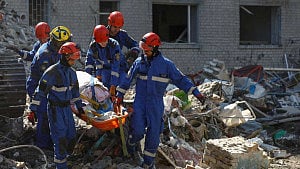 Kyiv mourns 30 killed in Russian attack
