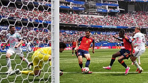 Spain edges past Belgium into World Cup semis