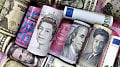 Yen slides past 163