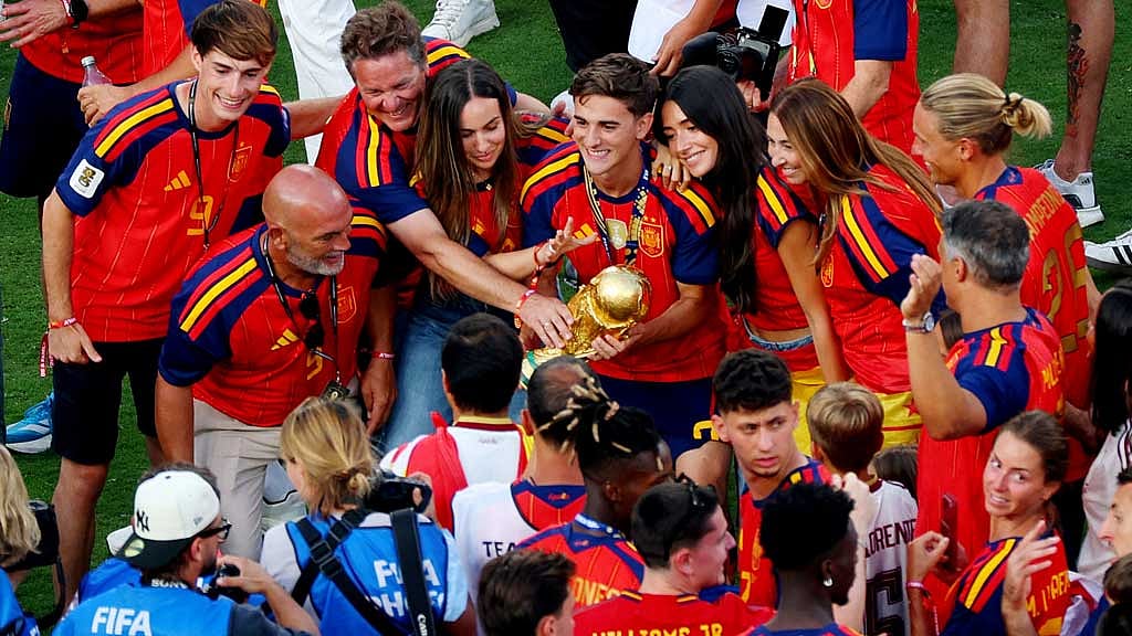 FIFA World Cup 2026 - Final - Spain v Argentina - New York/New Jersey Stadium, East Rutherford, New Jersey, US - Jul 19, 2026 Spain's Gavi with the World Cup trophy as he celebrates with members of his family REUTERS/Mike Segar