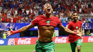 Morocco fight back to advance
