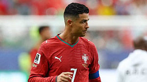 Coach defends keeping Ronaldo on in draw
