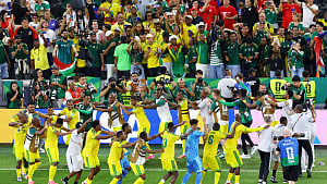 South Africa defy odds to reach World Cup last 32