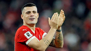 Swiss hit Jordan for four in rain