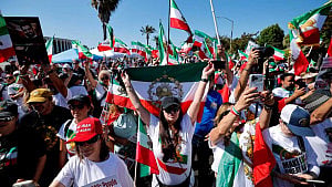 Iranian Americans protest, cheer at WC opener