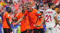 Netherlands cruise past Tunisia to clinch top spot