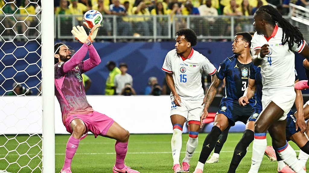 Brazil goalkeeper Alisson Becker saves from Haiti’s Ricardo Ade during the FIFA World Cup 2026 Group C match in Philadelphia, US, Jun 19, 2026. REUTERS/Dylan Martinez