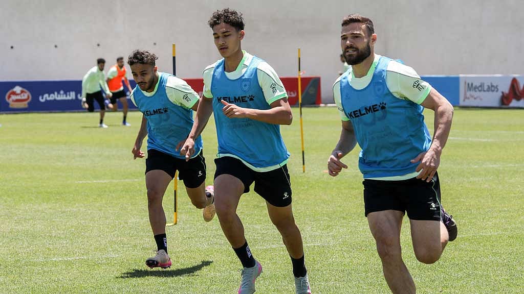 Jordan national soccer team players Ahmad Assaf, Yousef Qashi and Mohammad Al-Dawoud take part in a training session in preparation for the 2026 FIFA World Cup, in Amman, Jordan, May 24, 2026. REUTERS/Alaa Al Sukhni