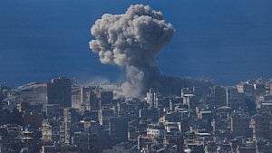 Israel hits Beirut as envoy says Hezbollah must disarm