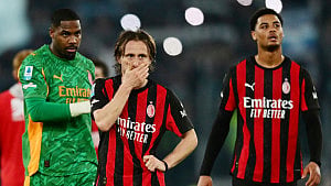 Lazio hold Milan, sink title hopes