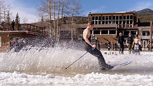 In record heat, US ski resorts bulldoze snow
