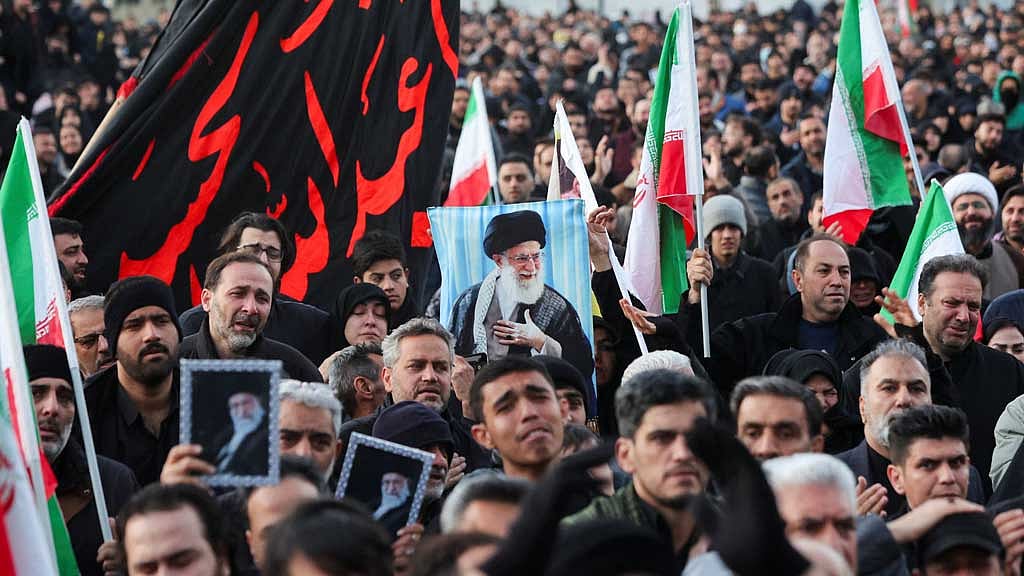 People react as they gather at the Enghelab Square, after Iran's Supreme Leader Ayatollah Ali Khamenei was killed in Israeli and US strikes on Saturday, in Tehran, Iran, March 1, 2026. Majid Asgaripour/WANA (West Asia News Agency) via REUTERS