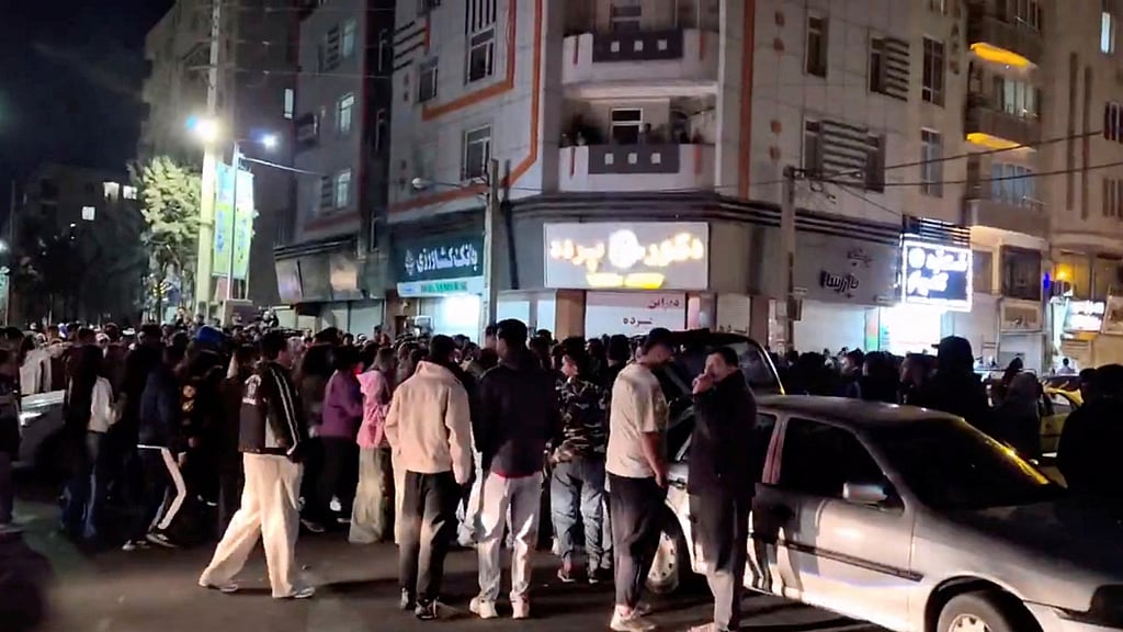 People gather to celebrate after reports of Iran's Supreme Leader Ayatollah Ali Khamenei's death, in the streets of Karaj, Alborz Province, Iran, in this screengrab obtained from a social media video released on Feb 28, 2026. Social Media/via REUTERS