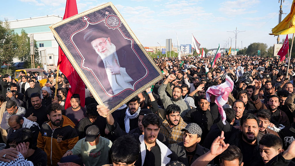 People march after Iran’s Supreme Leader Ayatollah Ali Khamenei was killed in Israeli and US strikes, in Basra, Iraq, Mar 1, 2026. REUTERS