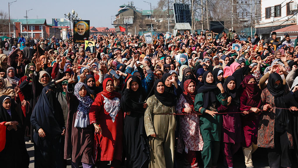 Shi'ite Muslim women react as they gather for a protest march, after Iran's Supreme Leader Ayatollah Ali Khamenei was killed in Israeli and US strikes on Saturday, in Srinagar, Indian Kashmir Mar 1, 2026. REUTERS
