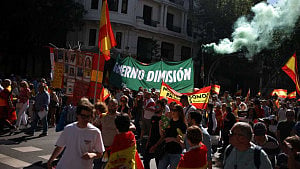 Thousands march in Madrid demanding PM’s resignation