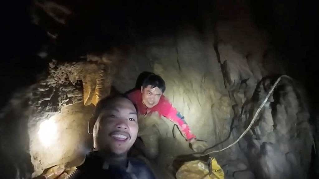Rescuers race to save 7 trapped in Laos cave