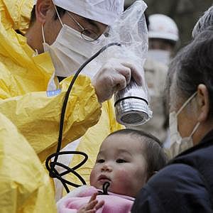 Babies being tested for radiation in Nihonmatsu, Fukushima. Photo: Reuters 