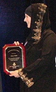 Lauren Booth accepting a plaque for her service to Palestine from ICNA. Photo: Hasan Zillur Rahim 