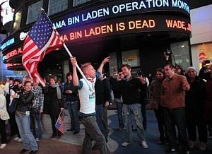 People react to the death of Osama bin Laden in Times Square in New York early May 2, 2011. Photo: Reuters 