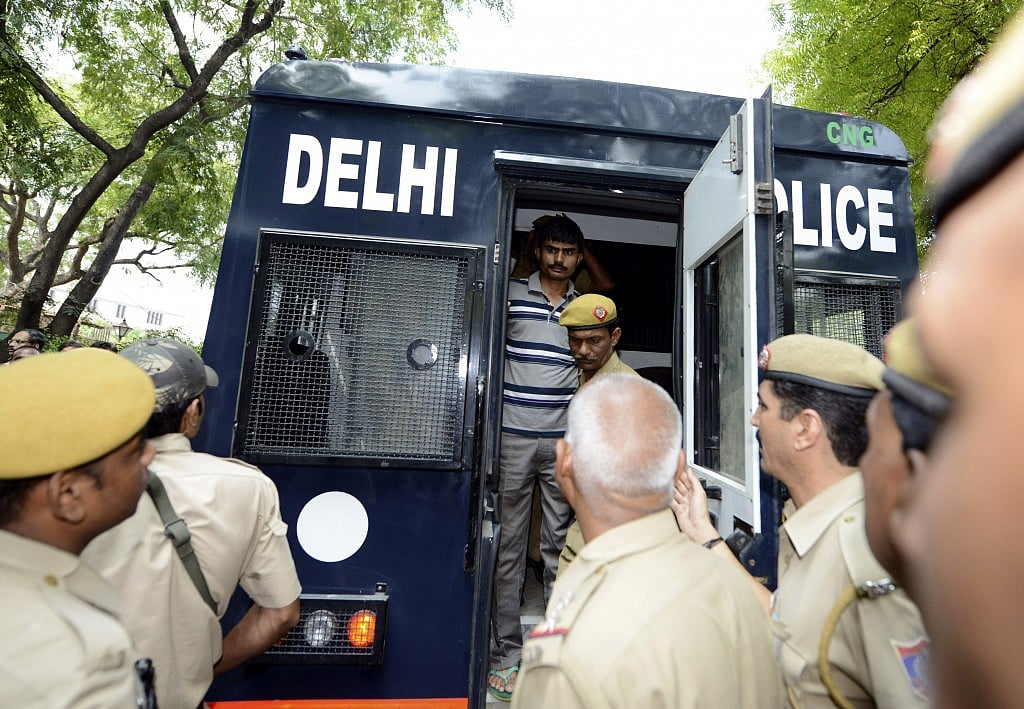 Akshay Thakur (top), one of the four men sentenced to death for rape and murder of a young woman on a bus last December. REUTERS/Stringer. Akshay Thakur (top), one of the four men sentenced to death for rape and murder of a young woman on a bus last December. REUTERS/Stringer.