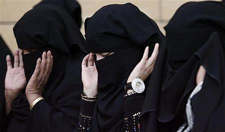 Saudi women pray during Eid al-Adha celebrations on a street in Riyadh. REUTERS/STRINGER. 